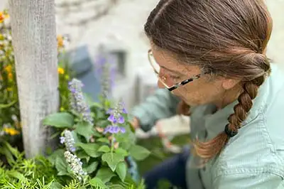girl planting - gardening services naples